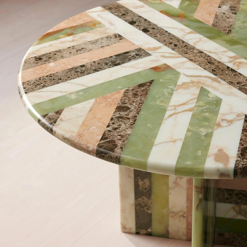 Edge view of geometric multi-marble round table - mosaic stone pattern & polished edge detail
