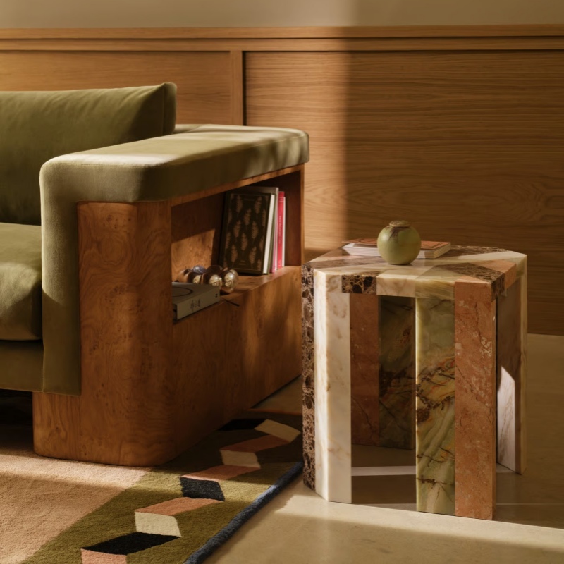 Multi-Marble Hexagon Side Table next to green velvet sofa - styled living room accent piece