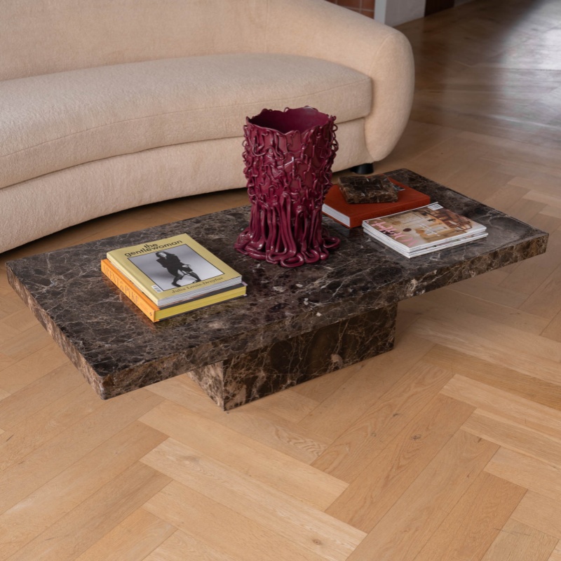 Dark Emperador Marble Coffee Table styled with decor & magazines - living room centerpiece