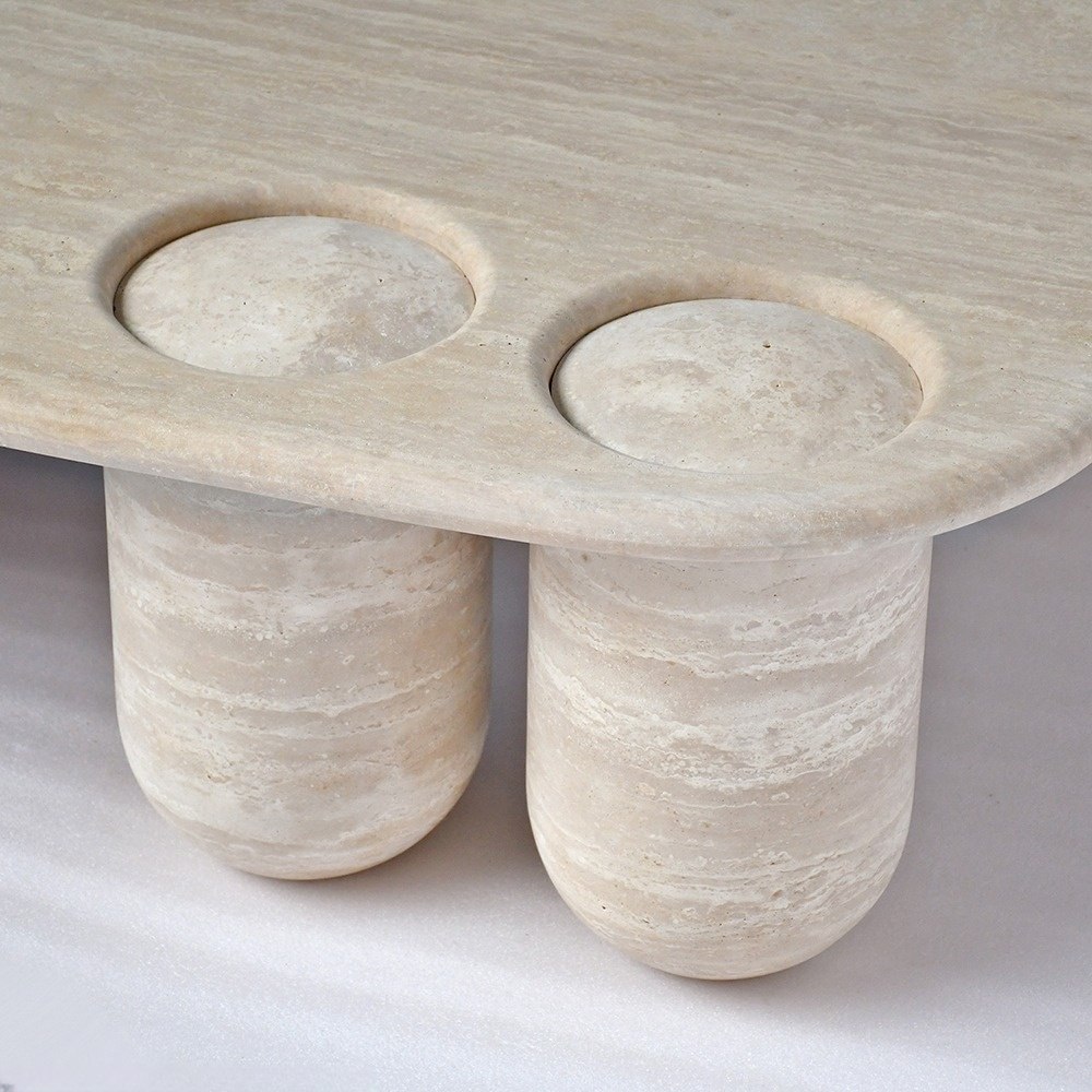 Close-up of Travertine Coffee Table - Recessed Circular Top & Cylindrical Leg Stone Texture Detail