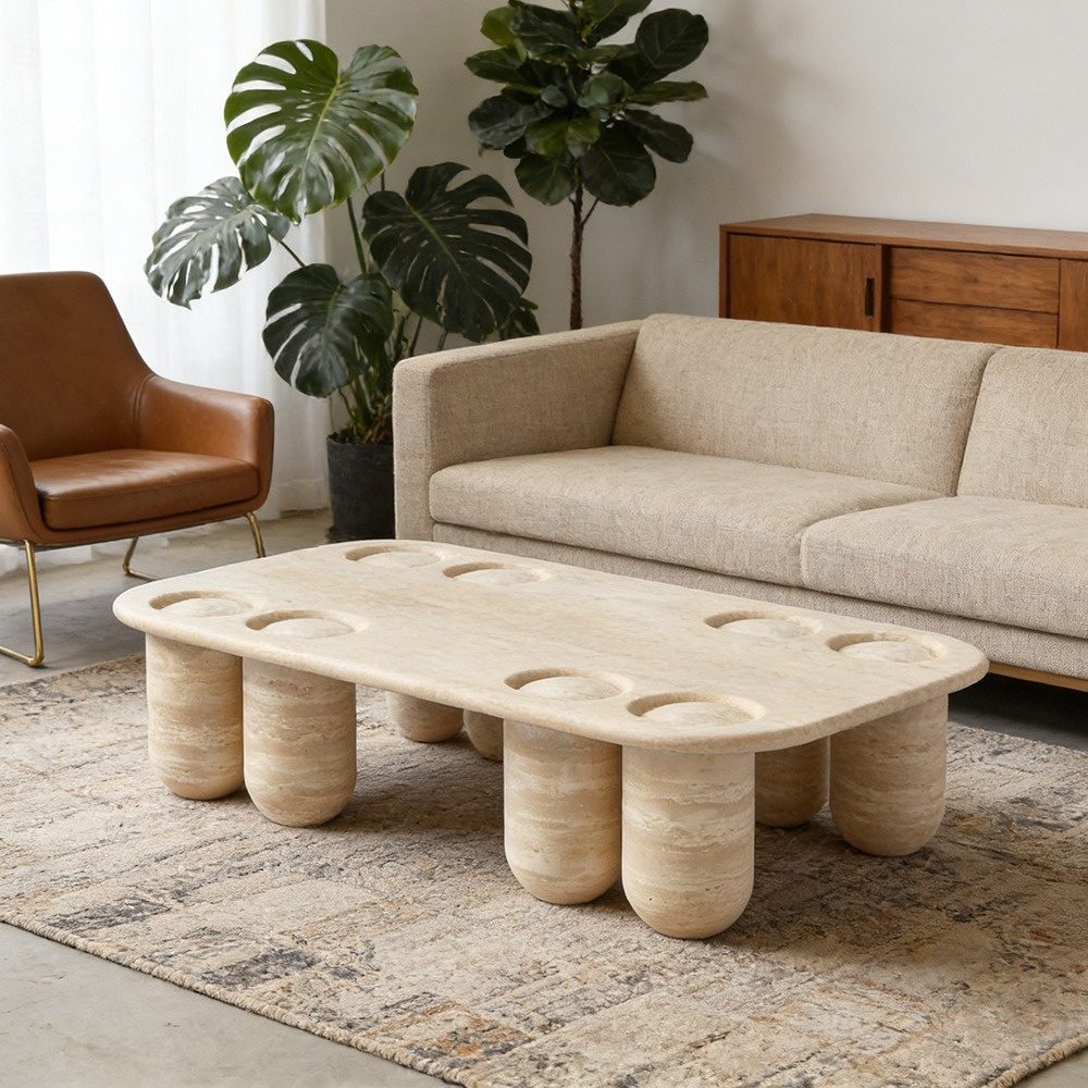 Mesa de centro de travertino con patas estriadas