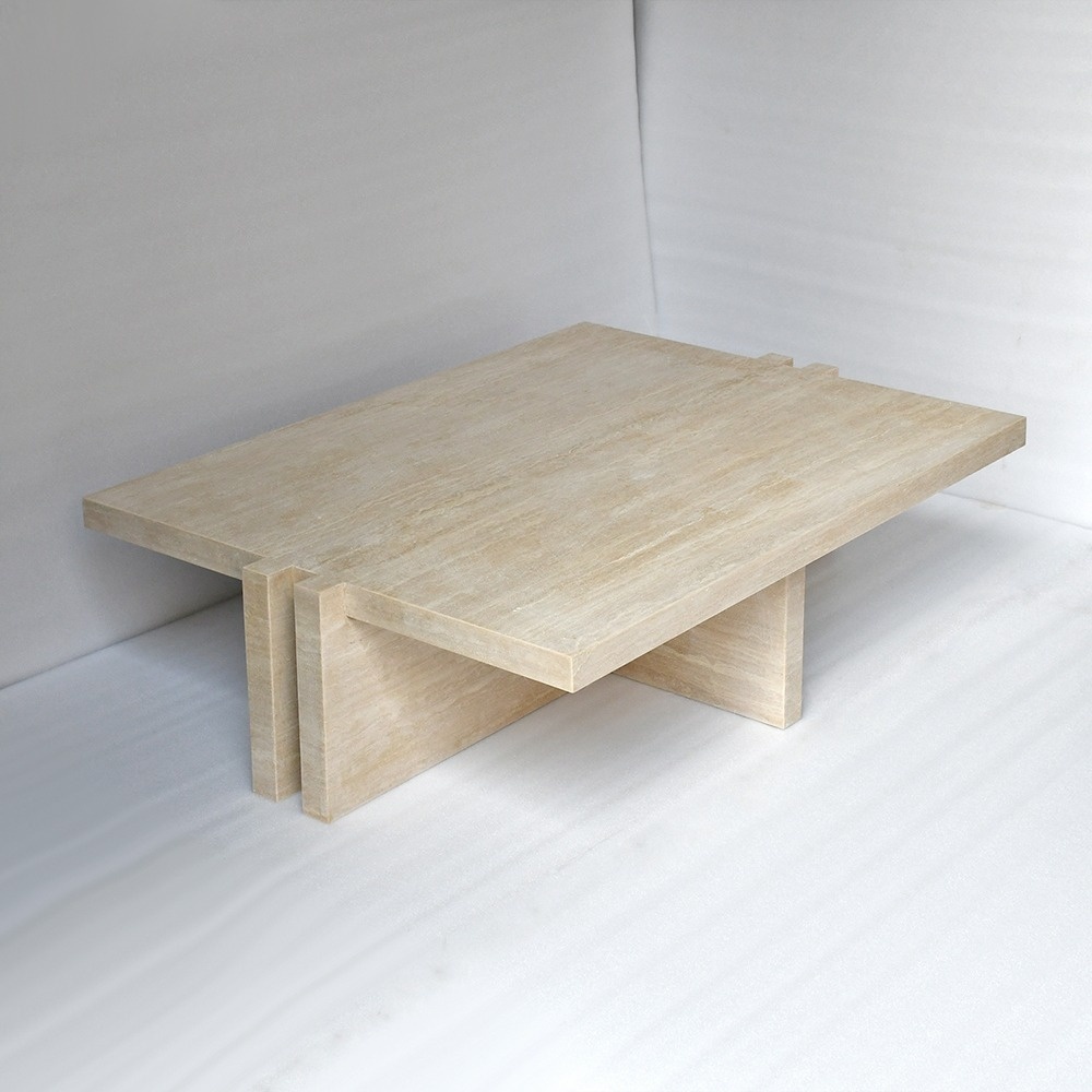 Beige travertine coffee table with interlocking puzzle legs - minimalist architectural design